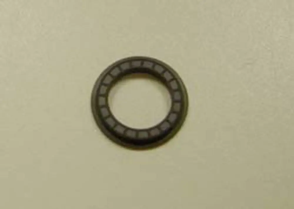 Dichtung in runder Form, möglicherweise für ein Gaskombiventil, auf einer neutralen Oberfläche. Produkt möglicherweise von Remeha.